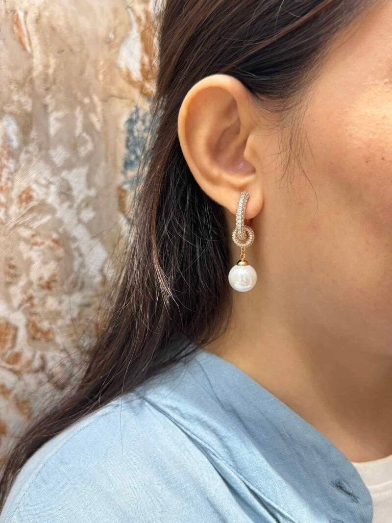 Handcrafted white pearl design earrings