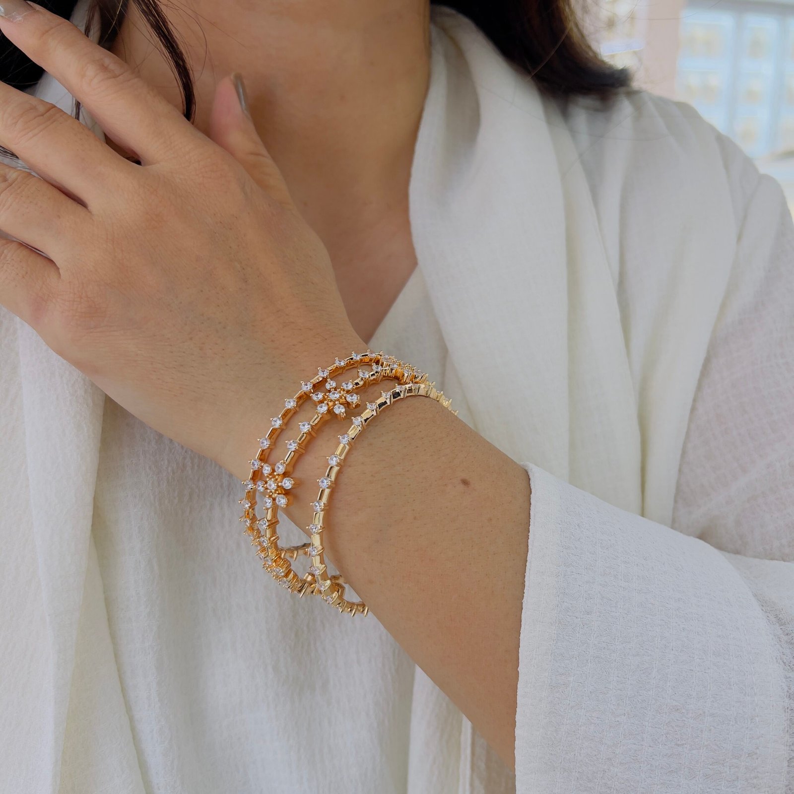 Exquisitely handcrafted designer bangles, finished in rich 18-carat gold plating for a timeless, luxurious look.”