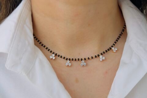 Handcrafted 18-carat gold-plated mangalsutra with hanging five flowers