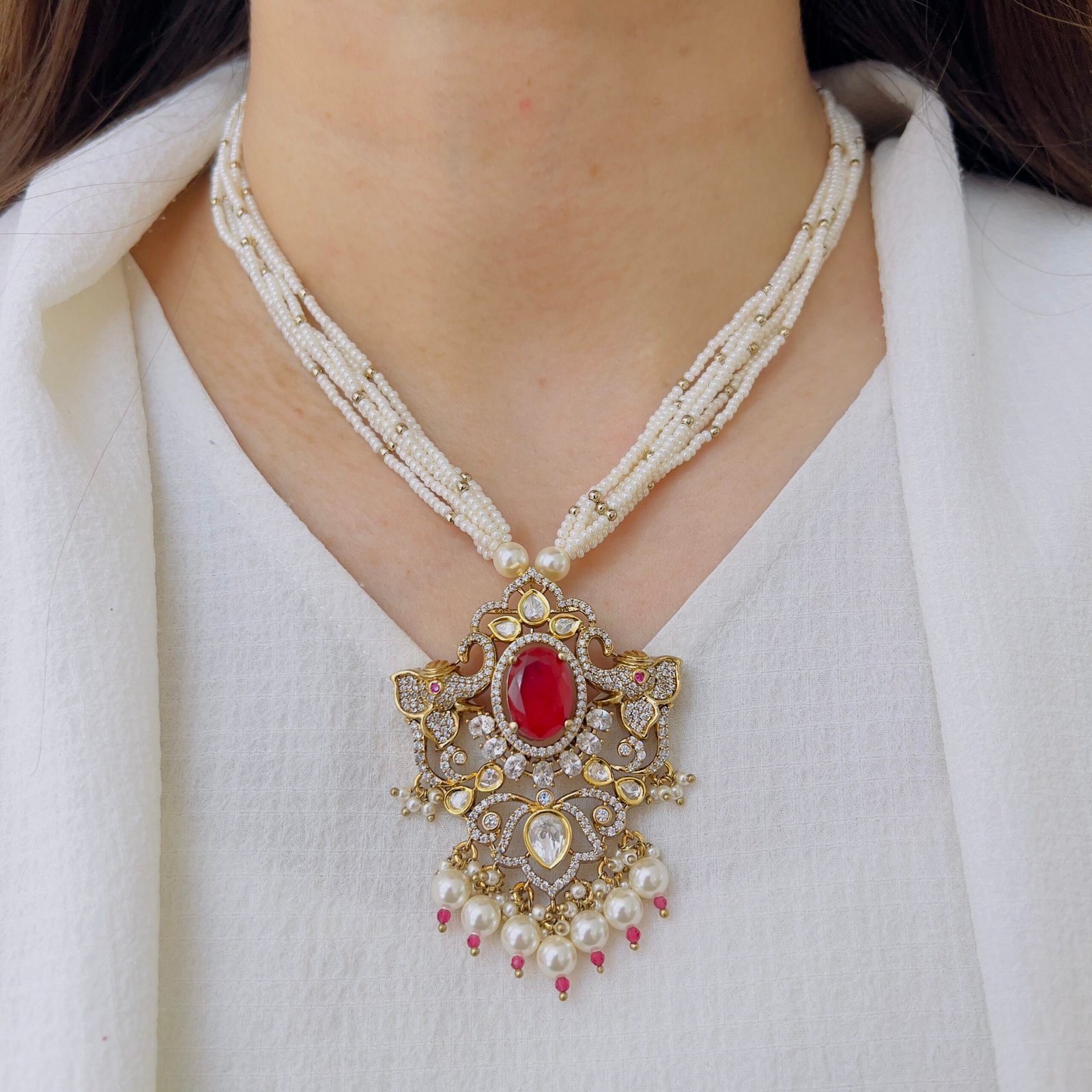 Ivory Whispers: Multi-Strand Seed Pearl Necklace with Mint Polki Pendant